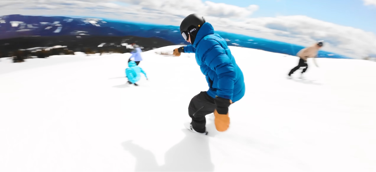 Friends sliding on mini skis